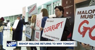 WATCH: Bishop Malone Ducks Reporters and Laity on Return from Rome
