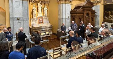LGBTQ Catholic Pilgrims Connect To History Of HIV/AIDS
